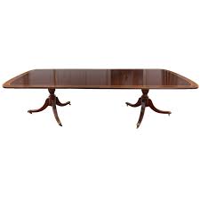 A footnote cradled in between the hepplewhite and federal styles, sheraton style was named for the famed london cabinetmaker, thomas sheraton. Sheraton Style Double Pedestal Mahogany Dining Table At 1stdibs