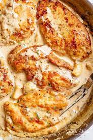 Heat oil until chicken will start frying when dropped in hot oil, let chicken brown fully on one side then turn delicious chicken dish. Creamy Garlic Chicken Breasts Cafe Delites