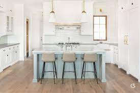 Before like i said, the before photos of this kitchen are nothing awful, just not in keeping with the homeowner's personal style and taste. Our Favorite White Kitchen Cabinet Paint Colors Christopher Scott Cabinetry