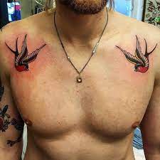 Pin By Erik On Tattoos Swallow Tattoo Chest Piece Tattoos Small Chest Tattoos