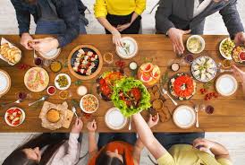 Wow your dinner guests with a shockingly easy dinner. People Eat Healthy Meals At Served Table Dinner Party Party Food Easy Healthy People Eating Healthy Recipes