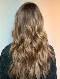 Layered dark brown hair with blonde highlights. 23 Best Spring Hair Color Ideas Of 2020 Glamour