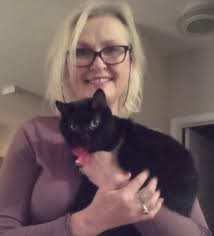 Here's Oling the Black cat, mom adopted her because she keeps
