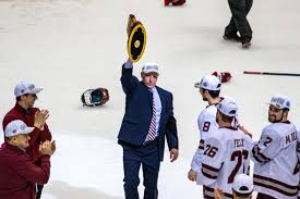 Umass amherst hockey head coach greg carvel (c) has a talk with his team. Yve76omg99qvrm