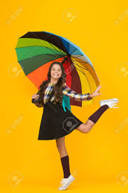 Looking at some gloomy faces on a rainy summer day gets me cranky too. On Way To School Cheerful Smiling Schoolgirl Rainy Day Fun Stock Photo Picture And Royalty Free Image Image 131760548