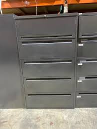 Who knows how to remove the drawer to the slides. Used Steelcase File Cabinets Furniturefinders
