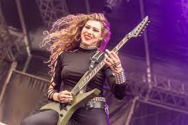 Swiss heavy metal band burning witches has parted ways with guitarist sonia anubis nusselder. File Burning Witches Rockharz 2019 30 Jpg Wikimedia Commons
