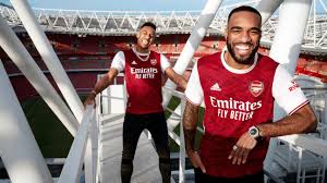 This page displays a detailed overview of the club's current squad. Arsenal Stars Unveil 2020 21 Home Kit With Aubameyang Lacazette And Luiz On Emirates Stadium Roof