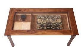 Hillsdale marsala round coffee table. Game Glass Display Coffee Table