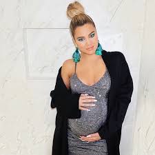 Click through to see all the looks khloé's worn over the years. Khloe Kardashian S Sequined Maternity Dress February 2018 Popsugar Fashion