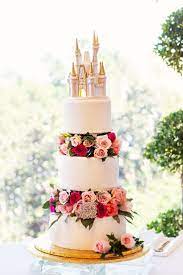 This Is How Much A Disney World Wedding Costs Disney Wedding Cake Disney World Wedding Wedding Cake Fresh Flowers