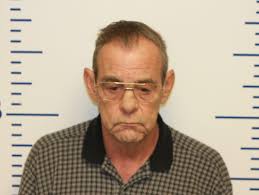 Former Edmond high school janitor booked