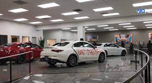 On the street of broadway and street number is 2915. Rioters Torch Cars In A Mercedes Benz Dealership During Protests In The U S