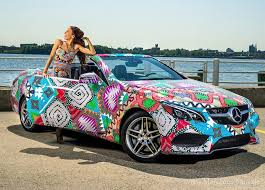 The Mercedes E Class Convertible Is An Advertising Campaign For The Fashion Event Mercedes Benz Fashion Week Swim Wrapping Voiture Habillage Voiture Voiture