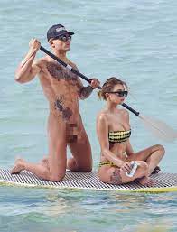 Olivia Buckland and Alex Bowen get naked to recreate THAT Orlando Bloom and  Katy Perry paddleboard moment | The Sun