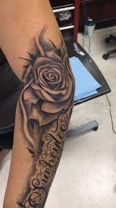 See more ideas about rose tattoos, tattoos, rose tattoo. Custom Writing Tattoo With Black And Gray Rose Video Writing Tattoos Rose Tattoos For Men Black And Grey Rose