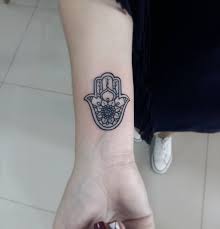 Because of the size reduction, a hamsa tattoo must be kept clean and simple. Wrist Hamsa Hamsa Hand Tattoo Hand Tattoos Small Hamsa Tattoo