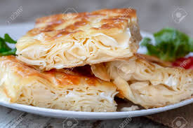 Üzerine 1 kepçe sütlü karışımı ekleyip güzelce yayın. Su Boregi Turkish Patty On Wooden Surface Stock Photo Picture And Royalty Free Image Image 152947352