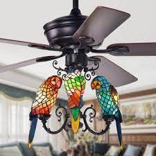 Whether you purchase a set of three individual shades or a whole bowl shaped light kit, you can surely find a stained glass accent that will bring color and cheer to your room. Korubo 3 Light 52 Inch Lighted Ceiling Fan Tiffany Style Parrot Shades Remote Controlled Ceiling Fan Ceiling Fan With Remote Black Ceiling Fan
