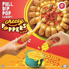 Our menu consists of pizzas of all sizes and flavours. Celebrate This Year End By Pull Dip Pop With Pizza Hut Malaysia S Latest Cheesy Poppers Pizza Trendgrnd