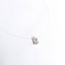 This graceful diamond pendant features over forty round brilliant cut diamonds in a striking oval design. Floating Diamond Oval Necklace Desert Diamonds Jewelry