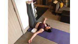 Two foam blocks, a bolster, and a cotton or a wool blanket. 7 Pose Restorative Yoga Without Props While Traveling