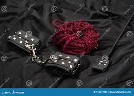 Leather Handcuffs, Shibari Rope and Stack on Black Background Stock Photo -  Image of kinky, accessory: 173657986