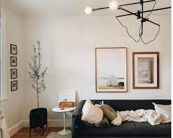 Most people hang pictures much higher by default, but you will soon see how much of a difference the 57 inch rule makes. How High To Hang Pictures Answered Framebridge