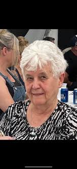 Removing green background and adding wings to funeral poster