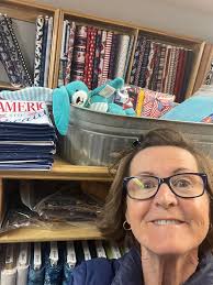 a quilt or wall covering ...Books galore !