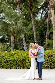 Wedding Portrait In Front Of The Palms On Sanibel Island Florida Beach Wedding Wedding Portraits Destination Wedding Inspiration