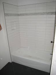 Subway tiles are beloved for their timelessness, so keep things classic with a white repeating bond pattern. Am Dolce Vita Subway Tile Stacked Or Brick Pattern Patterned Bathroom Tiles Shower Tile White Subway Tile Shower