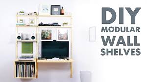 A black wall with floating shelves and a desk with displays and much light. Diy Modern Wall Shelf Desk Metal And Plywood Modern Builds Youtube