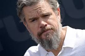 Movie star Matt Damon rocks full head of grey hair, bushy beard at Netflix  event