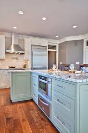 We redid our 30 year old kitchen cabinets in a 2 tone: Crazy For Color Your Kitchen Cabinets Want In