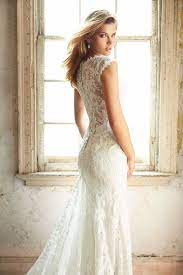 Not only do our mermaid style bridal dresses vary in sleeves, but fabrics, necklines and colors as well. Gorgeous Gowns From Allure Bridals An Allure Love Stories Giveaway Lace Back Wedding Dress Wedding Dresses Lace Weddings