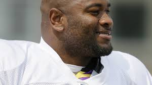 Vikings keep defensive tackle Tom Johnson with three-year deal