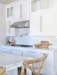 10 Simple Tips For Styling The Kitchen Counters White Modern Farmhouse Kitchen White Shaker C Modern Kitchen Counters Kitchen Countertop Decor Countertop Decor