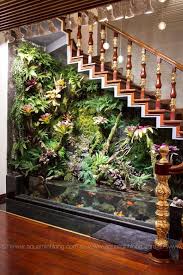 Design And Construction Of A Vertical Garden In Nature So Called Vertical Gardens Are Often Created On The In 2020 Vertical Garden Indoor Water Garden Backyard Sheds