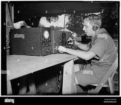 Larry Le Kashman, of New York City, with the short-wave radio 22936v Stock  Photo