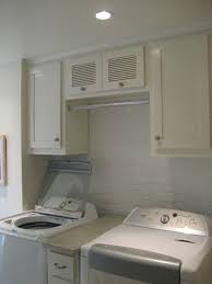 I've eyed that ballard drying rack, too, as we don't have a rod in our laundry room (opted for cabinets instead). Traditional Laundry Room American Traditional Utility Room Atlanta Houzz