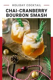 Below you'll find some fun christmas bourbon cocktails that we designed to keep your home feeling warm, festive, and full of holiday spirits. below the infographic, you'll find printable recipes for each. Chai Cranberry Bourbon Smash Recipe Cranberry Best Christmas Recipes Bourbon Cocktail Recipe