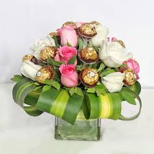 ferˈrɛːro roʃˈʃe) is a chocolate and hazelnut product produced by the italian confectionery company ferrero. Roses Ferrero Rocher Bouquet Gift Send New Year Gifts Online Hd1080549 Igp Com