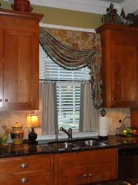 Above is an example of giving hard treatment to the kitchen window. Kitchen Decor Ideas Kitchen Window Treatment Ideas Bay Windows