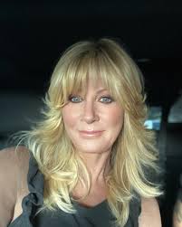 Day two with me and my Farrah hair-literally takes three hours of which I  have no patience, but THE END result is so worth it. Wish me luck today-  can't wait to