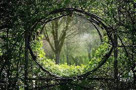 Garden Window In Medieval Garden At Prieure Notre Dame D Orsan Maisonnais France Photo Prieure Notre Dame D Garden Windows Garden Trellis Beautiful Gardens
