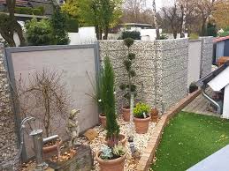 Vorher Nachher Design Wpc Zaun Mit Dekorativen Gabionen Holzlandbunzel Marl Hamm Www Bunzel De Wpc Zaun Bepflanzung Garten