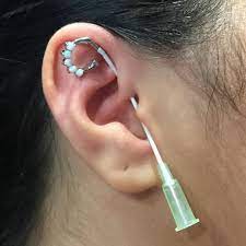 Lower Daith In Progress Using New Opal Clicker Hhasg Ykifd Lowerdaithpierc Piercings Clicker Daith Ear Jewelry Cool Ear Piercings Ear Piercings