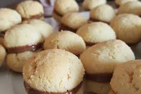 Recette Baisers De Dame Sables Aux Amandes Noisettes Et Chocolat En Video Recette Sable Amande Recette Dessert Recette Biscuit