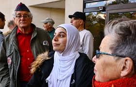 Protesters gather outside Toledo office of U.S. Rep. Marcy Kaptur